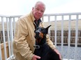 Craig Campbell with his dog Night, who saved him from a grizzly