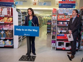 Premier Danielle Smith and then-health minister Jason Copping make an announcement about the availability of children’s medication on Dec. 6, 2022, in Edmonton.