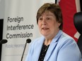 Commissioner Justice Marie-Josee Hogue speaks about the interim report following its release at the Public Inquiry Into Foreign Interference in Federal Electoral Processes and Democratic Institutions, in Ottawa, Friday, May 3, 2024.