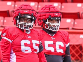 Calgary Stampeders offensive linemen Christy Nkanu, left and Brandon Weldon were photographed during the team's rookie camp at McMahon Stadium on Wednesday May 8, 2024.