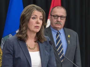 Premier Danielle Smith and Municipal Affairs Minister Ric McIver talk about legislation they will introduce addressing agreements between the federal government and provincial entities on Wednesday.