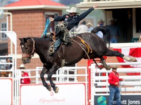 Dawson Hay was the Saddle Bronc Champion at the Calgary Stampede Rodeo on Sunday, July 16, 2023. Darren Makowichuk/Postmedia