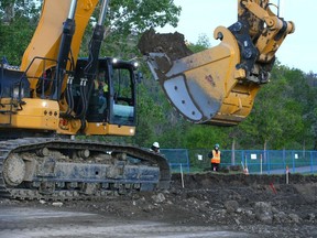Work continues during the repair of a water main break in northwest Calgary on Wednesday, June 19, 2024.
