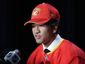 Zayne Parekh speaks to the media after being selected by the Calgary Flames with the ninth overall pick during the NHL Draft in Las Vegas on Friday, June 28, 2024.