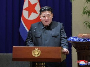 This picture taken on June 19, 2024 shows North Korea's leader Kim Jong Un speaking during a ceremony in Pyongyang.