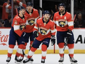 Panthers forward Sam Bennett (9) celebrates with teammates after scoring a goal against the Rangers during the first period in Game 6 of the Eastern Conference Final of the 2024 Stanley Cup Playoffs at Amerant Bank Arena in Sunrise, Fla., Saturday, June 1, 2024.