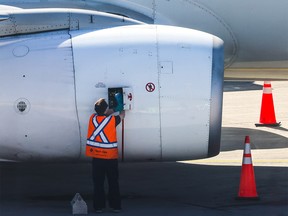 A WestJet technical operations employee at work