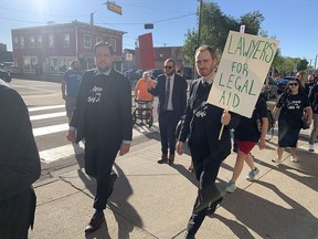 Around 40 defence lawyers were picketing outside the Edmonton Law Courts on Sept.2, 2022, in support of improved legal aid funding.