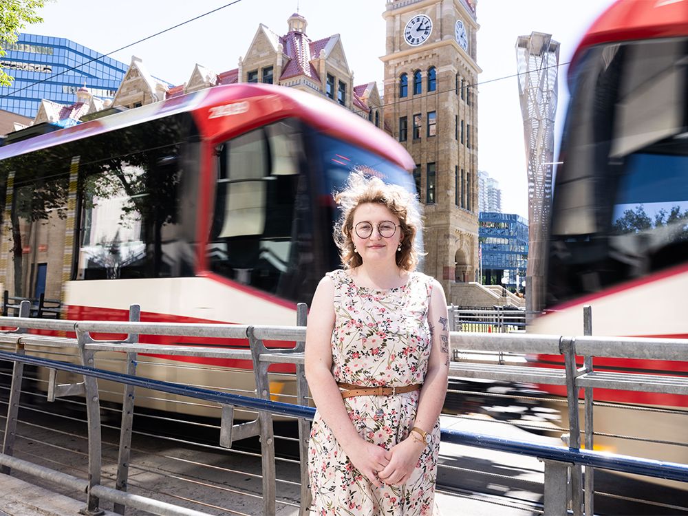 Calgarian Mariah Wilson Chahal poses by City Hall LRT station on Thursday, August 1, 2024. She and her husband recently moved to the southeast neighbourhood of Riverbend, with the Green Line’s planned construction being a major factor in the decision.