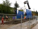 Crews work in Bowness to repair the Bearspaw south water feeder main in Calgary on Wednesday, August 28, 2024.
