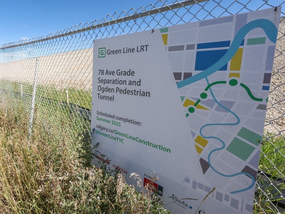 Signage and fencing mark the site of a future Ogden station for Calgary's CTrain Green Line on Wednesday July 31, 2024.