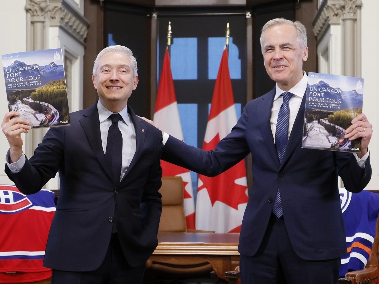 Finance Minister Francois-Philippe Champagne and Prime Minister Mark Carney meet before the spring economic update is delivered on Parliament Hill in Ottawa, on Tuesday, April 28, 2026.
