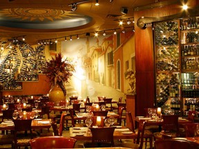 Via Allegro Ristorante’s 20,000-bottle cellar is enclosed in the middle of the ornate dining room.