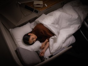 Cathay Pacific seats transform into fully flat beds with a turndown service and 600-thread-count cotton sheets, pillows selected from a menu, and spritzes of frankincense-, lavender- and marjoram-infused pillow mist.