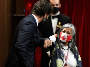 Prime Minister Justin Trudeau shares an elbow bump with Senator Ratna Omidvar. She is leading an effort to  amend the Income Tax Act that would enable Canadian donors to support a broader range of causes without sacrificing accountability or transparency.