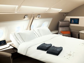 In addition to double beds, perks aboard Singapore Airlines include full-sized personal wardrobes and plush leather-upholstered chairs.