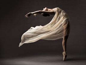 Female ballet dancer dancing in pointe shoes with a modern costume flowing behind her. From its early days feeding and billeting dancers to a world-class dance company creating new works, Canada’s National Ballet volunteer committee has a long history of dedicated members.