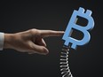 A finger pokes a Bitcoin symbol on a spring. Statistics regarding family office involvement in cryptocurrencies and other digital assets may give the impression that this group has an impressive level of involvement in the space, but some experts working with family offices say this isn’t what they’re seeing.