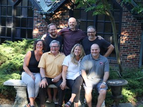 The Burton family includes (bottom, from left): Lisa, Jim, Kathryn and Greg; (top, from left): Nicholas, Doug and Jordie Burton.
