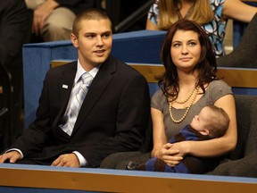 Track Palin sits with Willow Palin while holding Trig Palin on day three of the Republican National Convention (RNC) at the Xcel Energy Center on September 3, 2008 in St. Paul, Minnesota.