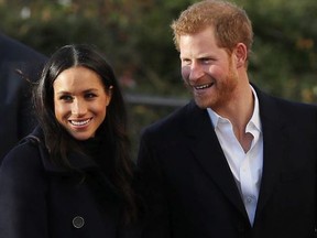 Prince Harry and his fiancee, US actress Meghan Markle, visit the Nottingham Academy as part of their first official public engagements togetheron December 1, 2017 in Nottingham, England.  Prince Harry and Meghan Markle announced their engagement on Monday 27th November 2017 and will marry at St George's Chapel, Windsor in May 2018.