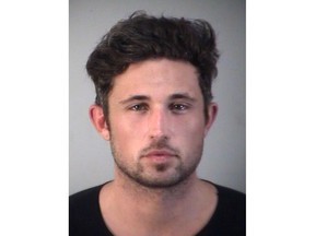 In this handout photo provided by the Lake County Sheriff's office, Country star singer Michael Ray Roach, 29, poses for his mugshot after his arrest for being under the influence of alcohol and possession of marijuana on December 20, 2017 in Tavares, Florida.