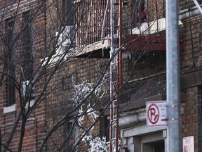 Ice forms along the fire escape of a building which caught fire the previious evening in the Bronx on December 29, 2017 in New York City. At least 12 people, including at least four children were killed in the early evening blaze which officials believe was started by a child playing with the stove.