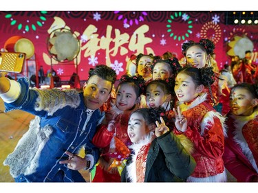 Chinese people celebrate the New Year during the New Year's Eve on December 31, 2017 in Beijing, China. China prepares a countdown event on December 31 to welcome the new year 2018.