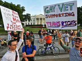 This file photo taken on July 26, 2017 shows protesters gathering in front of the White House in Washington, DC.