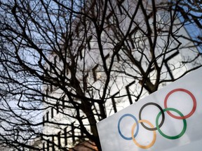 Olympic Rings are seen in front of the International Olympic Committee (IOC) headquarters on December 5, 2017 in Pully near Lausanne.