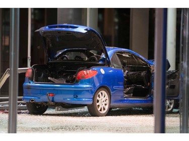 A car is seen in the lobby of the German Social Democratic Party headquarters after a vehicle was used to ram the building in Berlin early Dec. 25, 2017.  (ODD ANDERSEN/AFP/Getty Images)