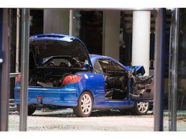 A car is seen in the lobby of the German Social Democratic Party headquarters after a vehicle was used to ram the building in Berlin early Dec. 25, 2017.  (ODD ANDERSEN/AFP/Getty Images)