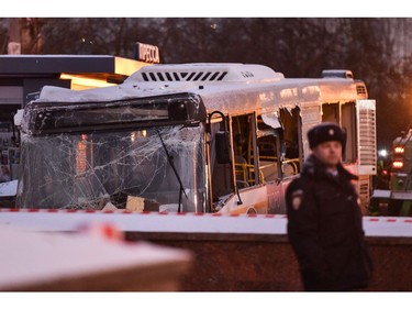 Rescuers pull out a city bus after it plowed into a pedestrian underpass in western Moscow on Dec. 25, 2017. (VASILY MAXIMOV/AFP/Getty Images)