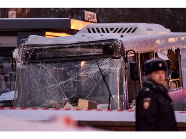 Rescuers pull out a city bus after it plowed into a pedestrian underpass in western Moscow on Dec. 25, 2017. (VASILY MAXIMOV/AFP/Getty Images)