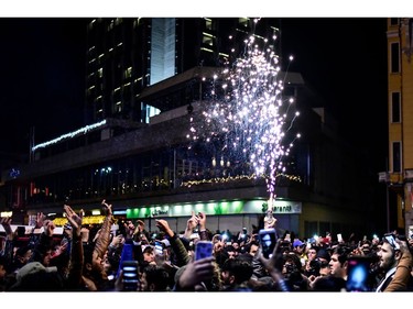 Revellers bid farewell to 2017 as they gather to celebrate New Years in Istanbul on December 31, 2017. Turkey arrested on December 31, 2017, more suspected Islamic State (IS) group jihadists in a major crackdown on the extremist group ahead of a New Year overshadowed by the first anniversary of the nightclub terror attack that left 39 dead.