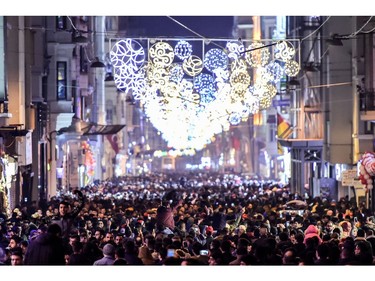 Revellers bid farewell to 2017 as they gather to celebrate New Years in Istanbul on December 31, 2017. Turkey arrested on December 31, 2017, more suspected Islamic State (IS) group jihadists in a major crackdown on the extremist group ahead of a New Year overshadowed by the first anniversary of the nightclub terror attack that left 39 dead.