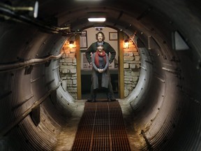 In this Nov. 2, 2017 photo, Mathew Fulkerson and his wife Leigh Ann pose at their Subterra Airbnb located in a former underground missile silo base near Eskridge, Kan. The Subterra Castle Airbnb opened for business about six months ago (Thad Allton/The Topeka Capital-Journal via AP)