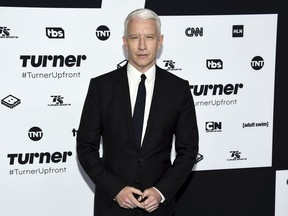 In this May 17, 2017, file photo, CNN News anchor Anderson Cooper attends the Turner Network 2017 Upfront presentation at The Theater at Madison Square Garden in New York. CNN is claiming Wednesday, Dec. 13, that Cooper's Twitter account was hacked after a tweet from his handle called the president a "pathetic loser" following Democrat Doug Jones winning Alabama's special Senate election.