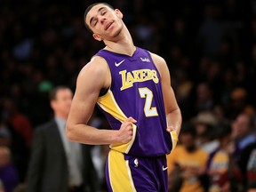 Los Angeles Lakers' Lonzo Ball reacts during the second half of a game against the Portland Trail Blazers at Staples Center on Dec. 23, 2017 in Los Angeles.   (Sean M. Haffey/Getty Images)