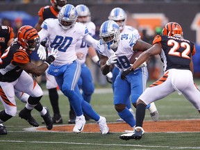 Tion Green of the Detroit Lions runs with the ball against the Cincinnati Bengals during the second half at Paul Brown Stadium on Dec. 24, 2017 in Cincinnati, Ohio.  (Joe Robbins/Getty Images)