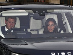 Prince Harry and Meghan Markle arrive for the Queen's Christmas lunch at Buckingham Palace, London, Wednesday Dec. 20, 2017.