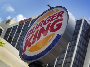 A Burger King sign hangs outside a restaurant September 1, 2010 in Miami, Florida.