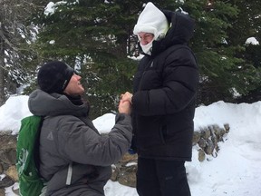 Josh Darnell, of Londonderry, New Hampshire, proposes to Rachel Raske, of Lowell, Massachusetts, on Thursday, Dec. 28, 2017, in Tuckerman's Ravine, New Hampshire.
