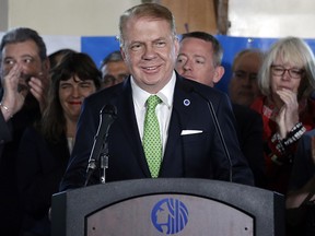 Seattle Mayor Ed Murray smiles as supporters Tuesday, May 9, 2017, in Seattle.