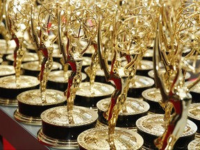 This Sept. 17, 2017 image released by the Television Academy shows Emmy statues during the 69th Primetime Emmy Awards in Los Angeles. The next Primetime Emmy Awards will move to Monday night to avoid a huge potential tackle by “Sunday Night Football.” NBC and the Television Academy said Tuesday,  (Eric Jamison/Television Academy via AP)