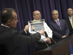 Anthony Riccio, chief of the Chicago Police Department's organized crime unit, describes an investigation into sales of drugs and guns in an invitation-only group on Facebook during a news conference at Chicago Police Department headquarters Thursday, Dec. 21 2017, in Chicago.