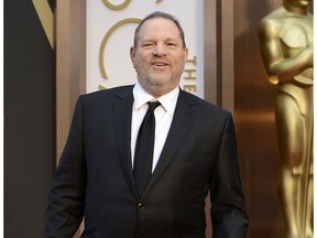 FILE - In this March 2, 2014 file photo, Harvey Weinstein arrives at the Oscars in Los Angeles. The Academy of Motion Pictures Arts and Science announced Wednesday, Dec. 6, 2017, that it had adopted its first code of conduct for its more than 8.400 members. The move by the organization that bestows the Oscars comes after the film academy expelled Weinstein in October in the wake of sexual harassment and abuse allegations leveled against him.