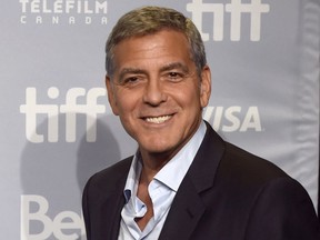 FILE - In this Sept. 10, 2017 file photo, George Clooney attends a press conference for "Suburbicon" at the Toronto International Film Festival in Toronto. Clooney will be the 46th recipient of the AFI Life Achievement Award. The American Film Institute announced Thursday that they will honor the actor-director at a gala tribute in June.
