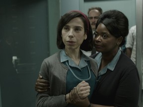 This image released by Fox Searchlight Pictures shows Sally Hawkins, left, and  Octavia Spencer in a scene from the film "The Shape of Water."