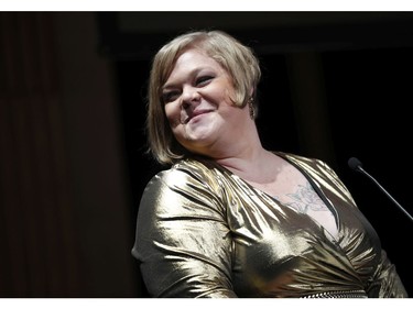 American writer, photographer, and activist, best known for being part of the body positive movement, Jes Baker, delivers a speech during a day against fat phobia in Paris, France, Friday, Dec. 15, 2017.